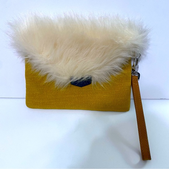 Kipling Handbags - Kipling faux fur flap over clutch, mustard yellow